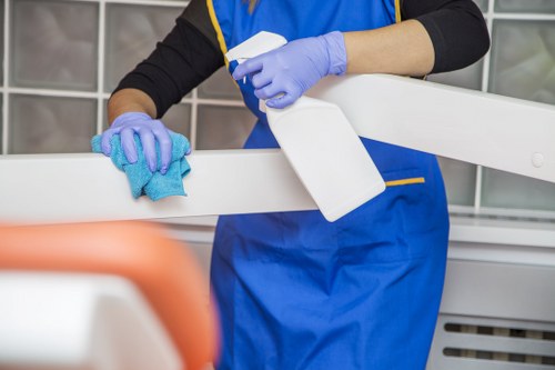 Cleaning technician performing carpet care with extraction equipment